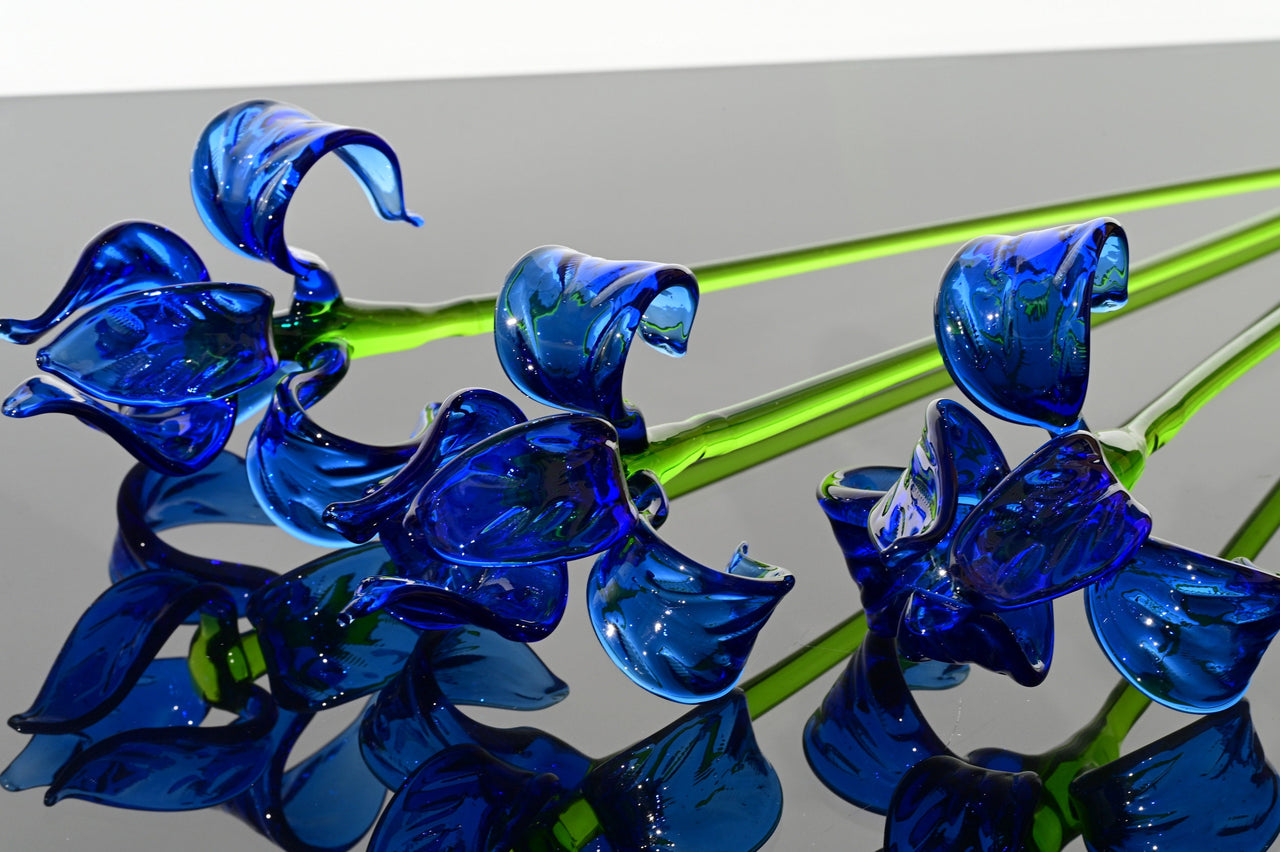Beautiful extra long blue glass Iris flower. Excellent addition to your decor collection, unique gift. Each flower is priced individually.