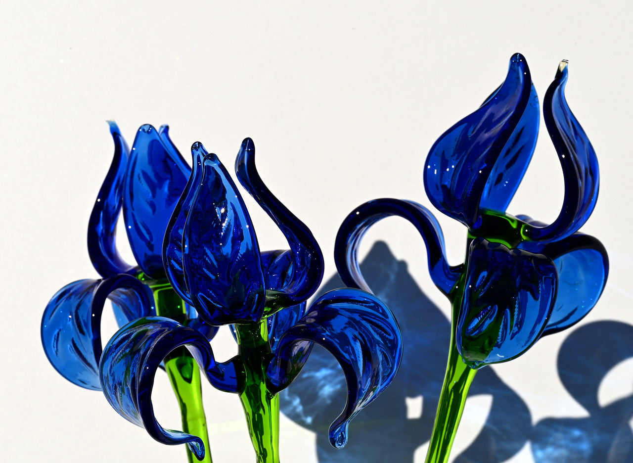 Beautiful extra long blue glass Iris flower. Excellent addition to your decor collection, unique gift. Each flower is priced individually.