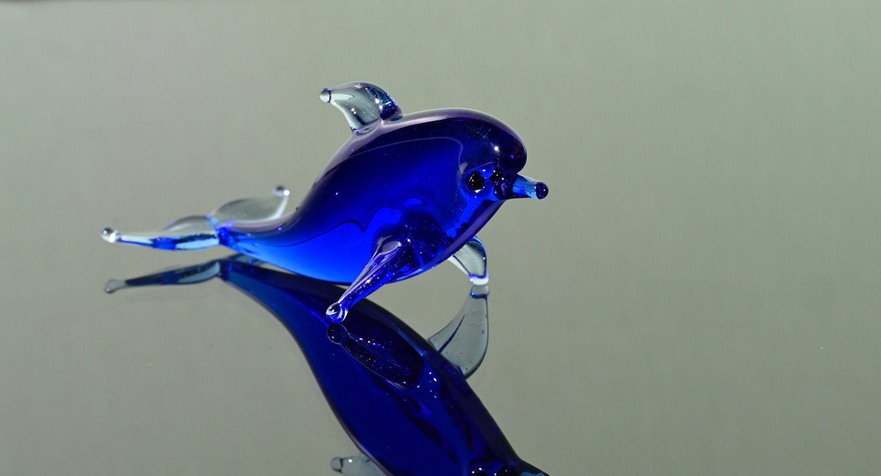 Blue Glass Dolphin Figurine: Whimsical Handmade Sculpture
