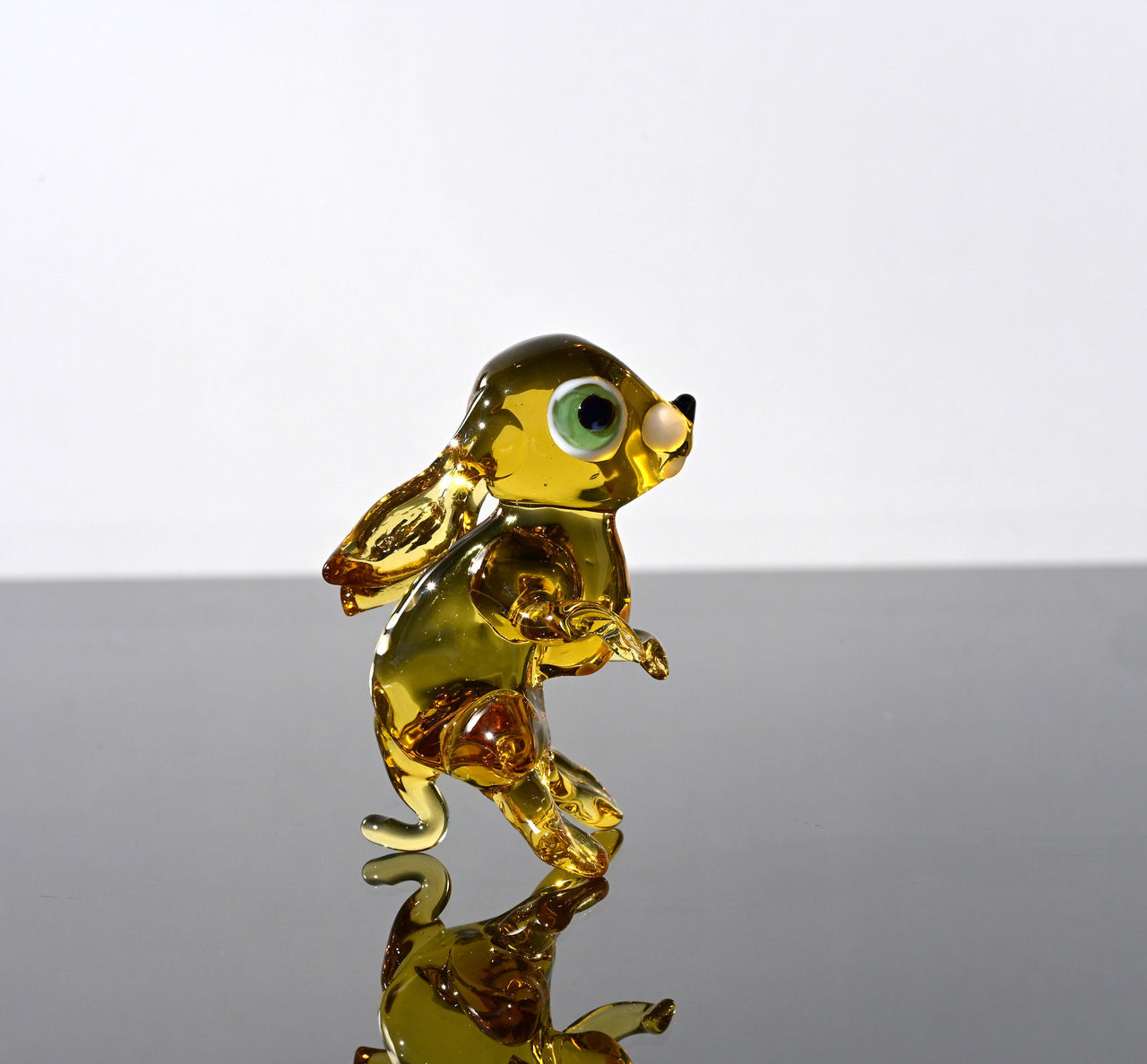 Handmade Amber Glass Bunny Figurine: Whimsical Sculpture