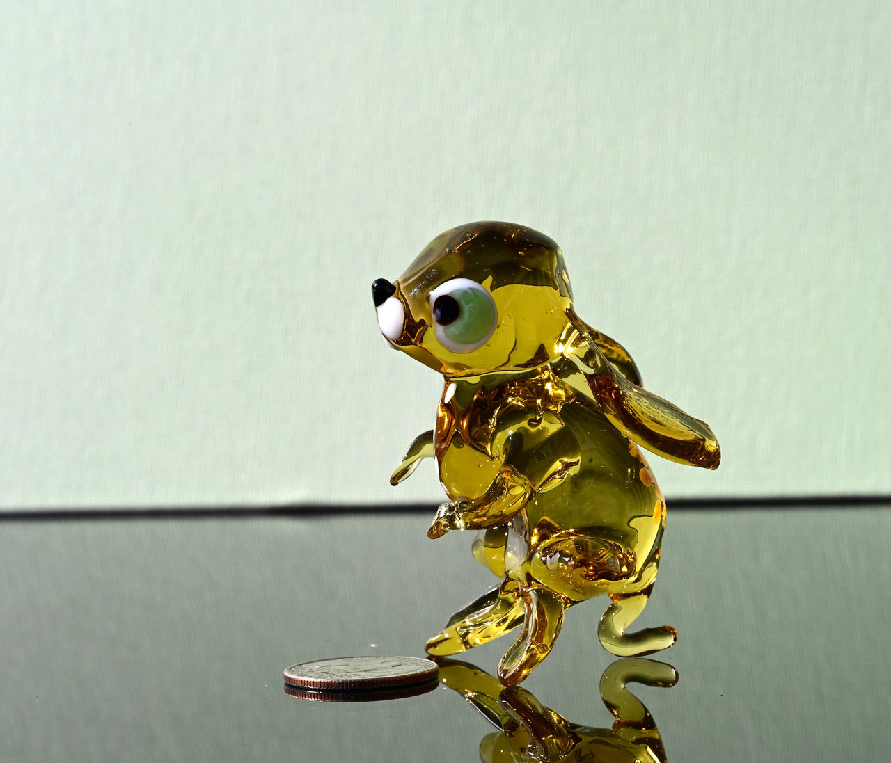Handmade Amber Glass Bunny Figurine: Whimsical Sculpture