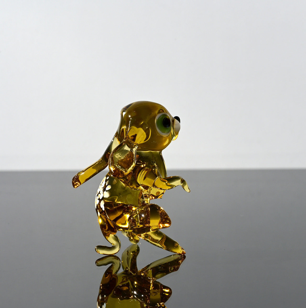 Handmade Amber Glass Bunny Figurine: Whimsical Sculpture