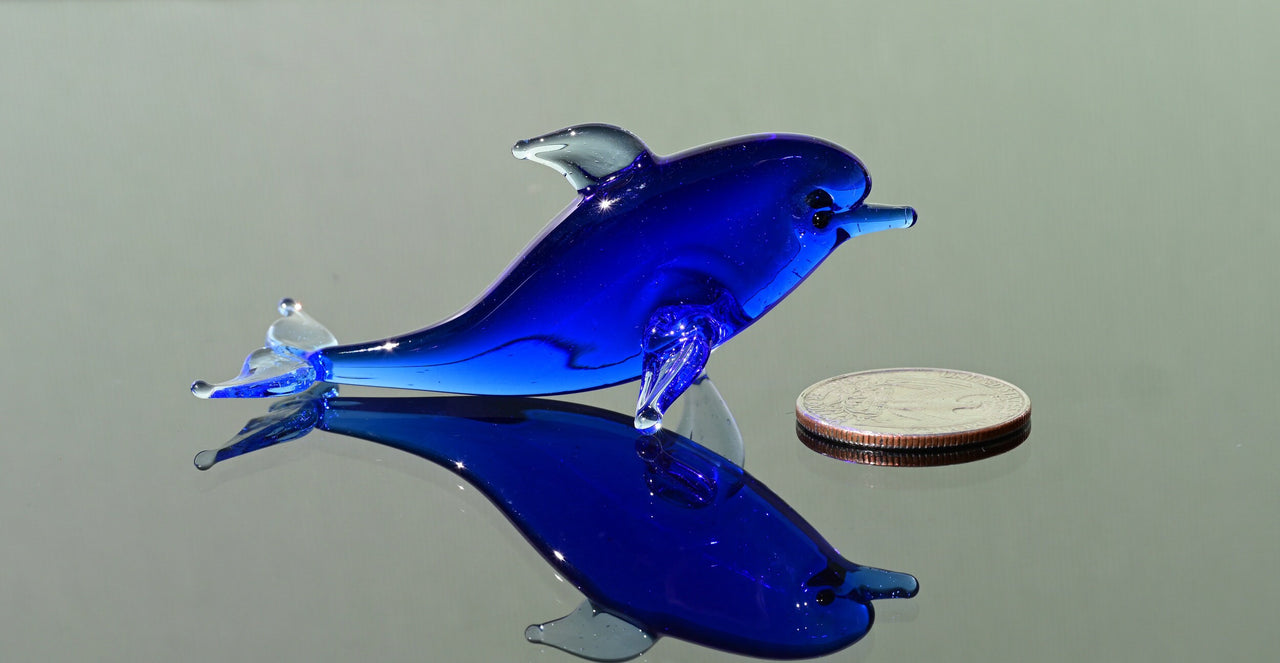 Blue Glass Dolphin Figurine: Whimsical Handmade Sculpture