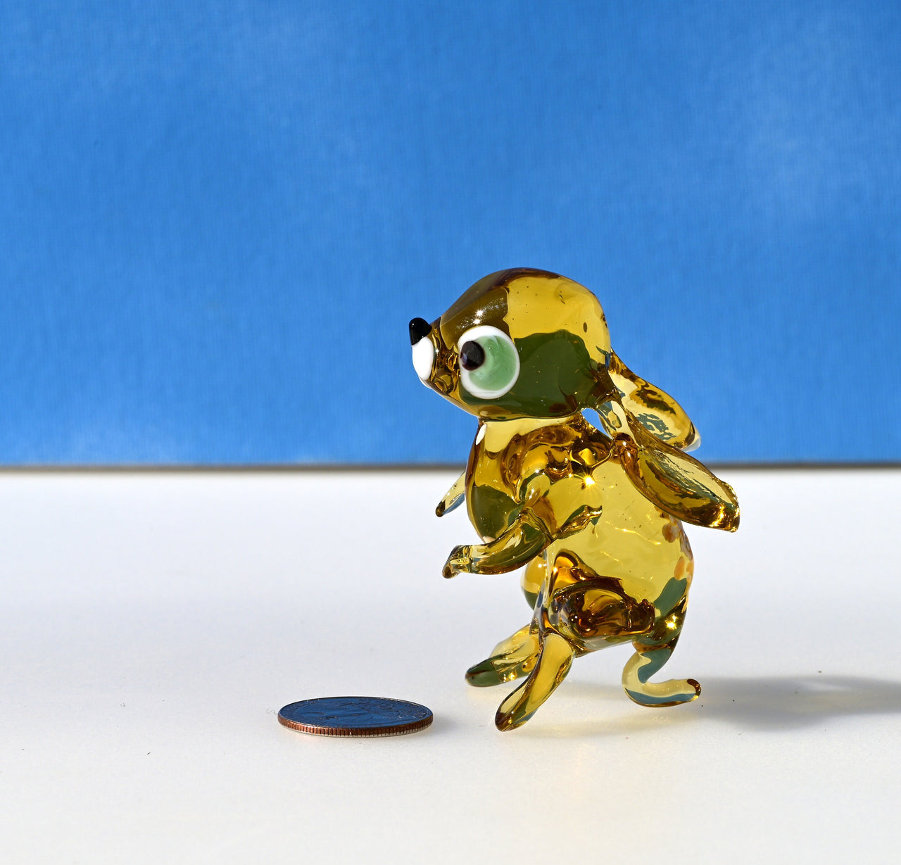 Handmade Amber Glass Bunny Figurine: Whimsical Sculpture