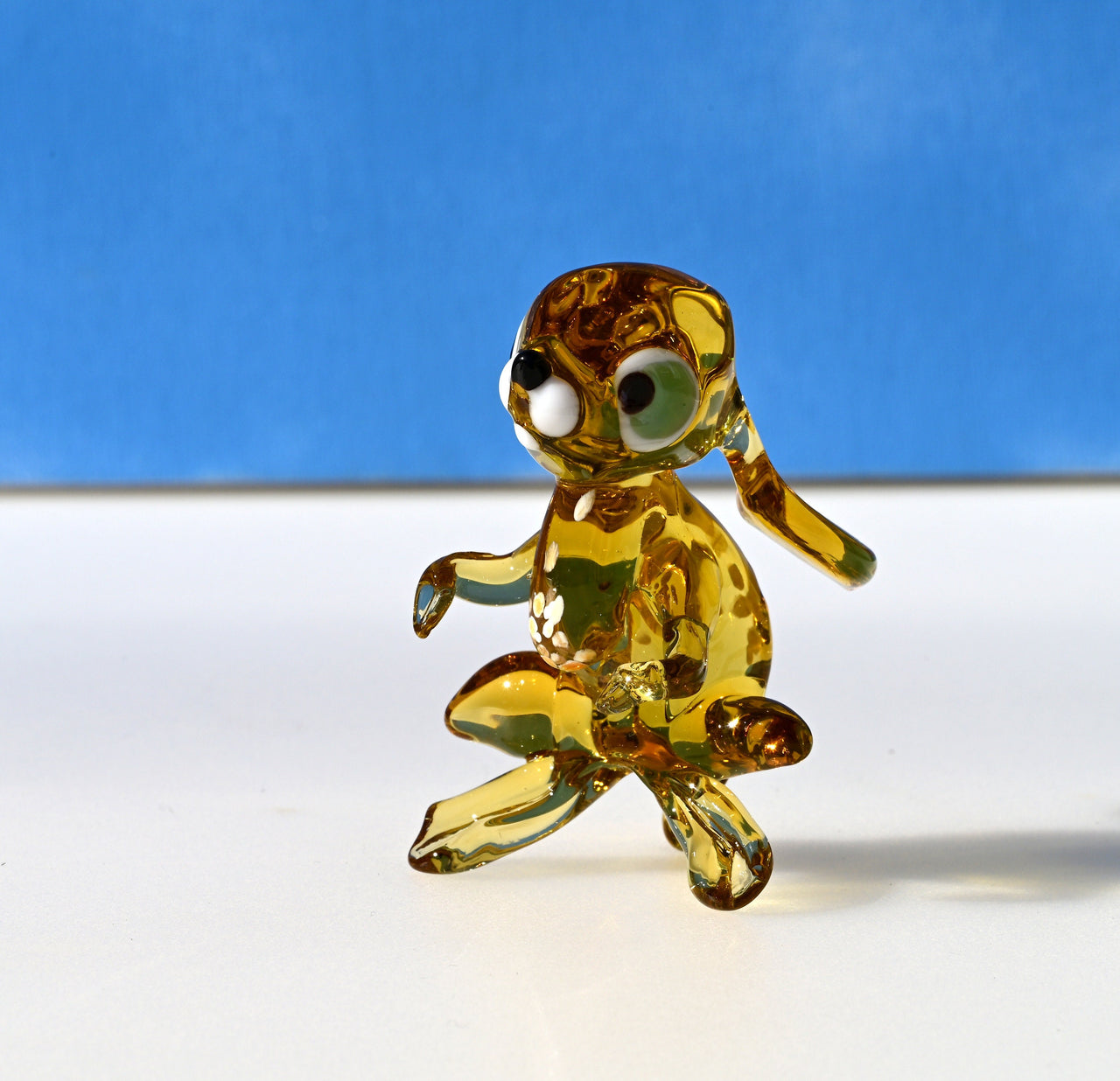 Handmade Amber Glass Bunny Figurine: Whimsical Sculpture