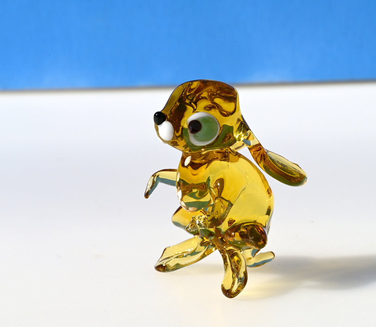 Handmade Amber Glass Bunny Figurine: Whimsical Sculpture