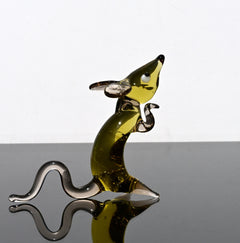 Cute amber- clear glass rat. Detailed figurine with a lot of personality.  It's an excellent addition to your glass animals collection.