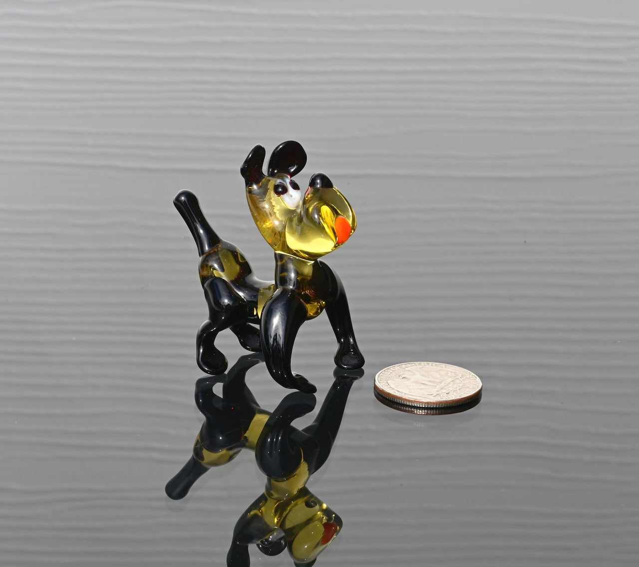 Cartoonish hand-blown glass Bulldog. Detailed figurine with character and personality. Excellent addition to your collection.