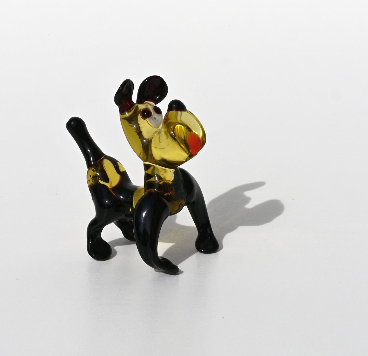 Cartoonish hand-blown glass Bulldog. Detailed figurine with character and personality. Excellent addition to your collection.