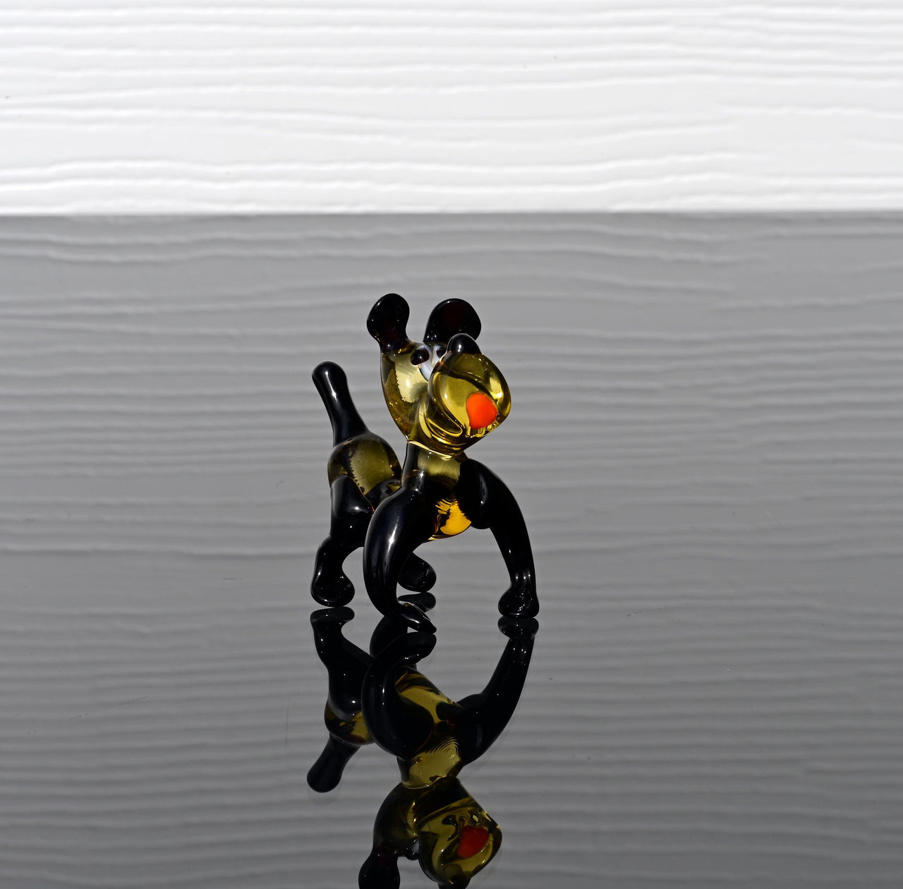 Cartoonish hand-blown glass Bulldog. Detailed figurine with character and personality. Excellent addition to your collection.