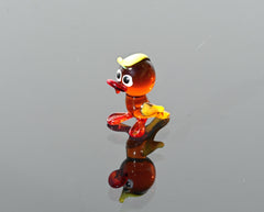 Handmade Amber Glass Tiny Duck: Whimsical Glass Menagerie Collectible