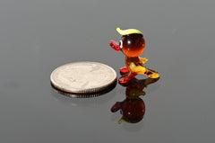 Handmade Amber Glass Tiny Duck: Whimsical Glass Menagerie Collectible