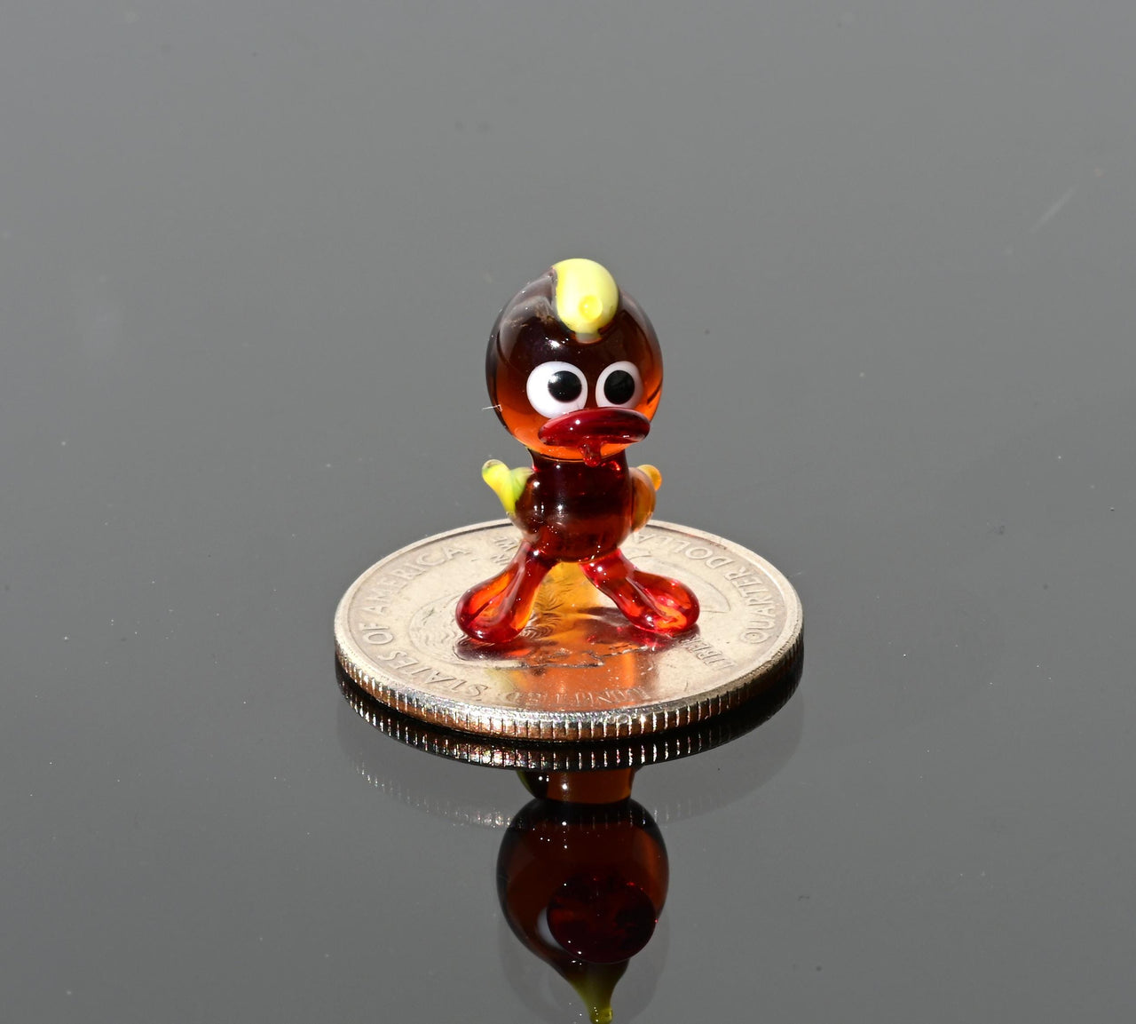 Handmade Amber Glass Tiny Duck: Whimsical Glass Menagerie Collectible