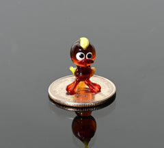 Handmade Amber Glass Tiny Duck: Whimsical Glass Menagerie Collectible