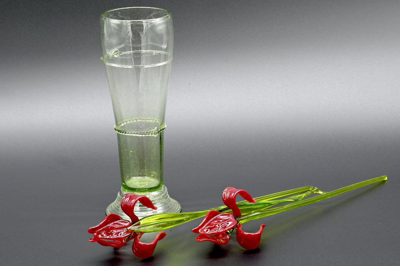 Two Deep red  13" Irises in a hand-blown transparent green glass vase, complete decor accent.