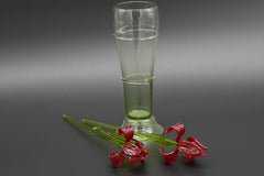 Two Deep red  13" Irises in a hand-blown transparent green glass vase, complete decor accent.