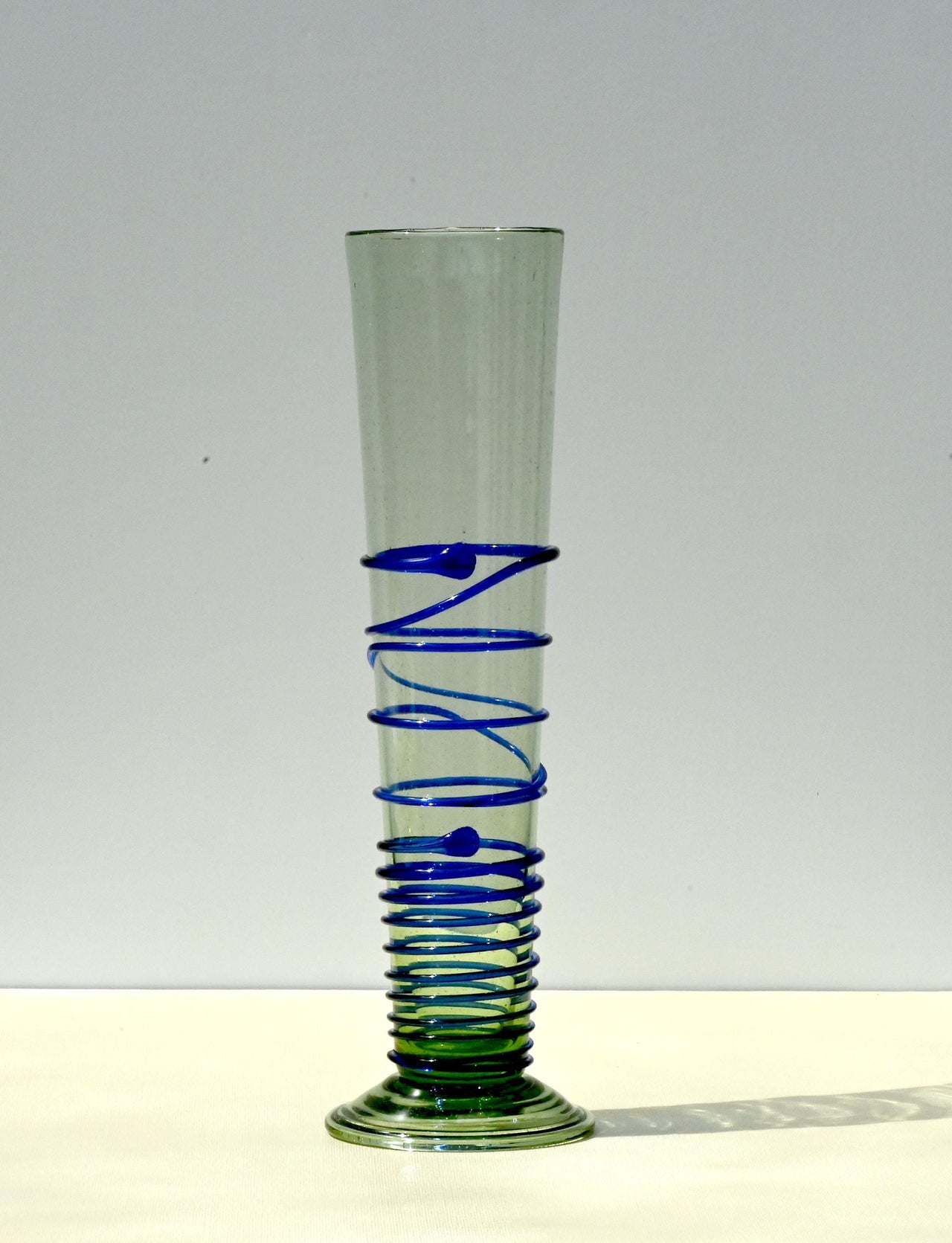 Cobalt blue 15.5" Iris in a hand-blown glass vase, complete decor accent.