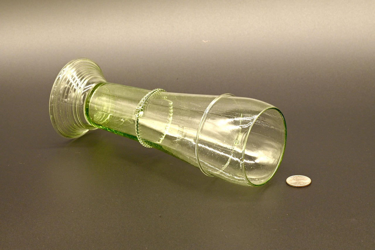 Two Deep red  13" Irises in a hand-blown transparent green glass vase, complete decor accent.