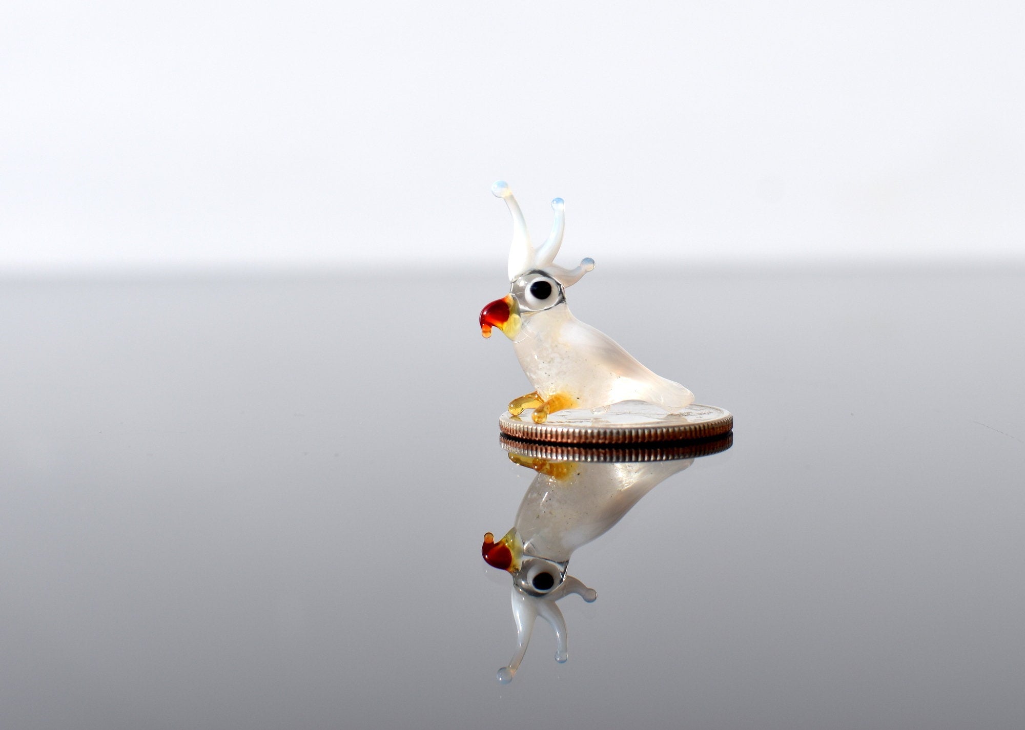 Handmade Glass Cockatoo Figurine: Whimsical Miniature Parrot Sculpture