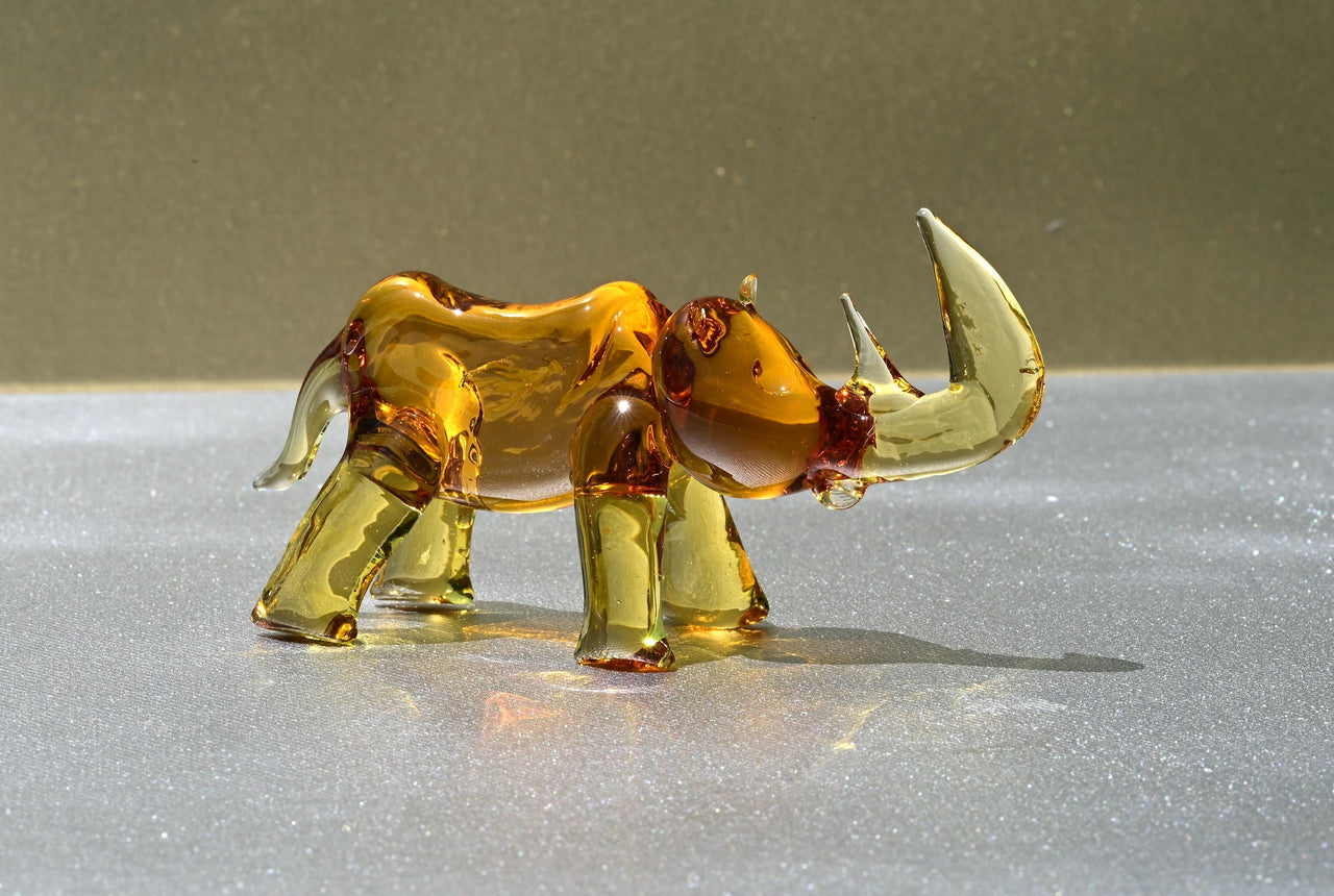 Hand Blown Glass Rhinoceros. Sculptured Rino figurine with character and personality, a collectible gift.