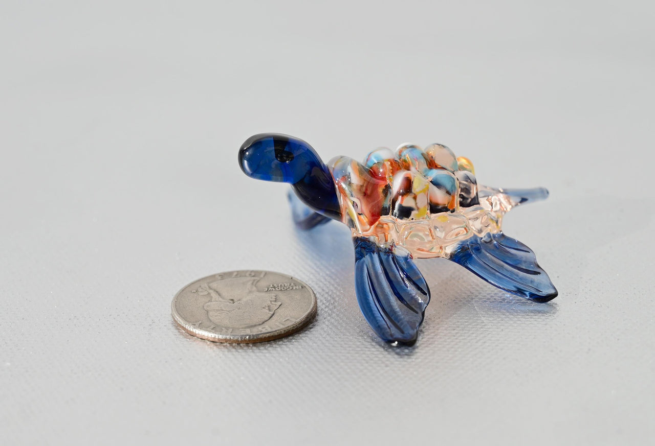 Hand-Blown Glass Sea Turtle – Collectible Art Figurine with a blue color accent.