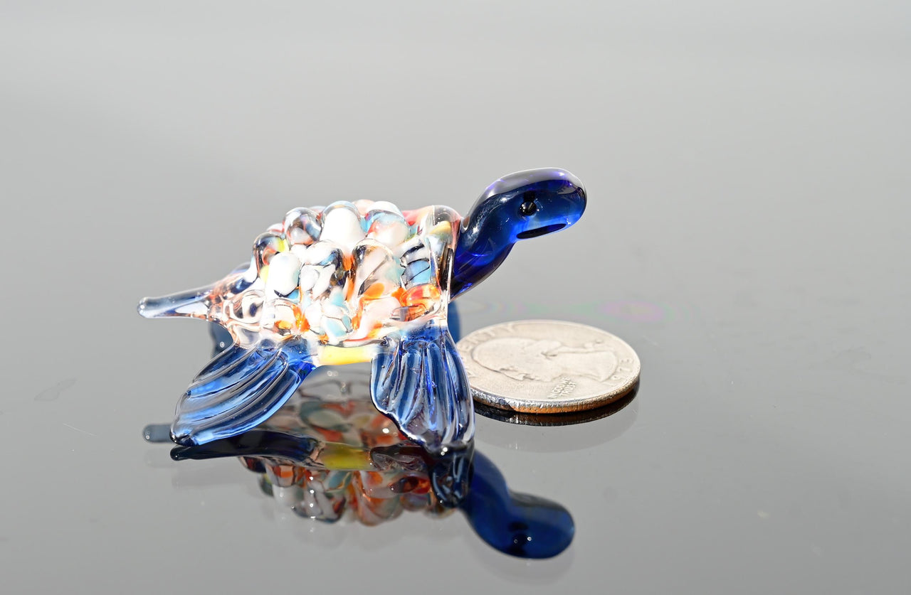 Hand-Blown Glass Sea Turtle – Collectible Art Figurine with a blue color accent.