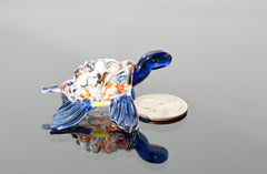 Hand-Blown Glass Sea Turtle – Collectible Art Figurine with a blue color accent.