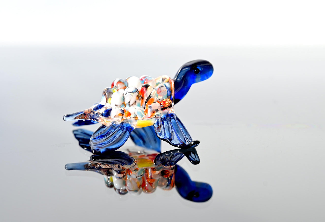 Hand-Blown Glass Sea Turtle – Collectible Art Figurine with a blue color accent.