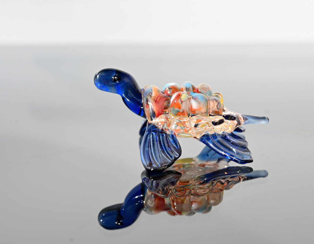 Hand-Blown Glass Sea Turtle – Collectible Art Figurine with a blue color accent.