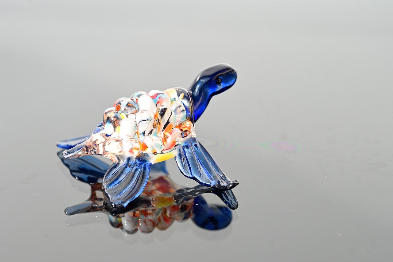 Hand-Blown Glass Sea Turtle – Collectible Art Figurine with a blue color accent.