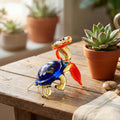 Hand Blown Glass Turtle with umbrella . Whimsical figurine with character and personality. Excellent addition to your collection.